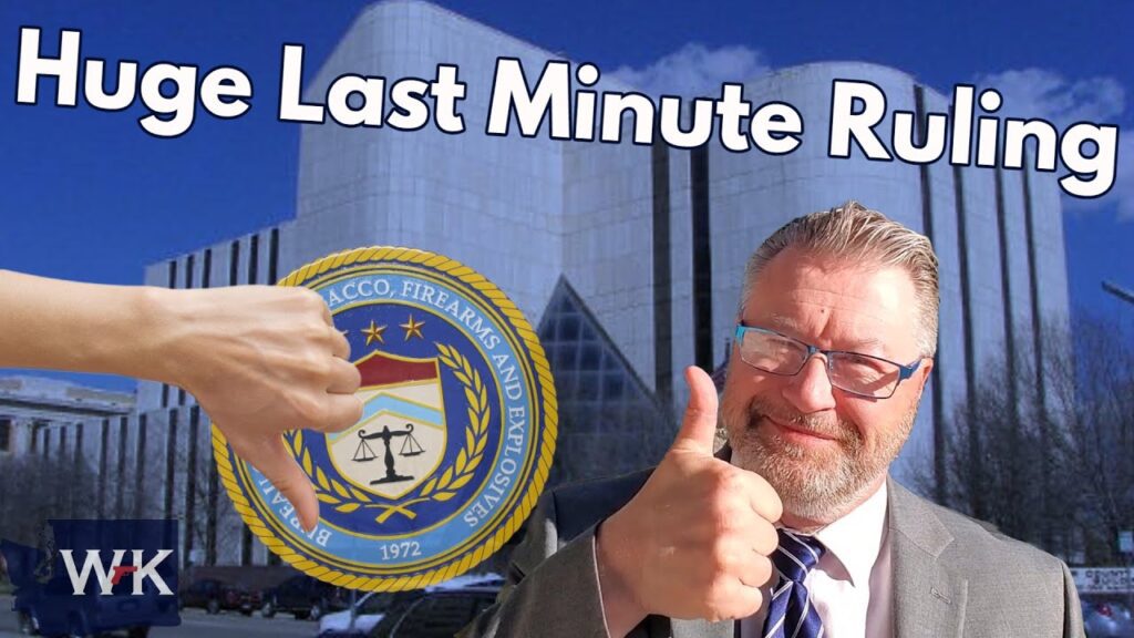 Smiling man giving thumbs up, large courthouse building in background. Text: "Huge Last Minute Ruling." Illustration of a hand pinching a Bureau of Alcohol, Tobacco, Firearms and Explosives logo.