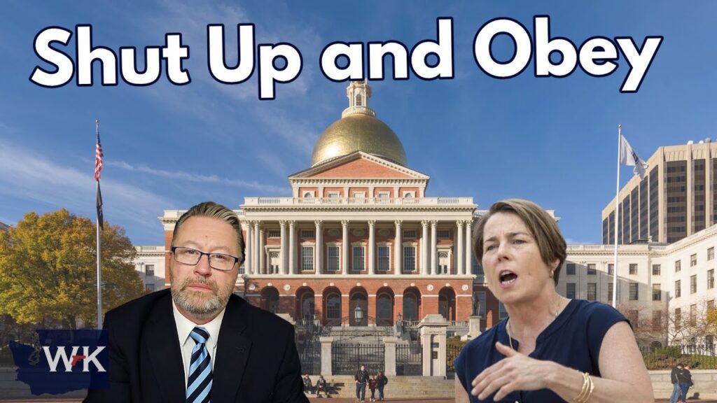 Composite image of a man in a suit and a woman speaking in front of the Massachusetts State House. Large text reads "Shut Up and Obey." The background shows a clear sky and part of a cityscape.