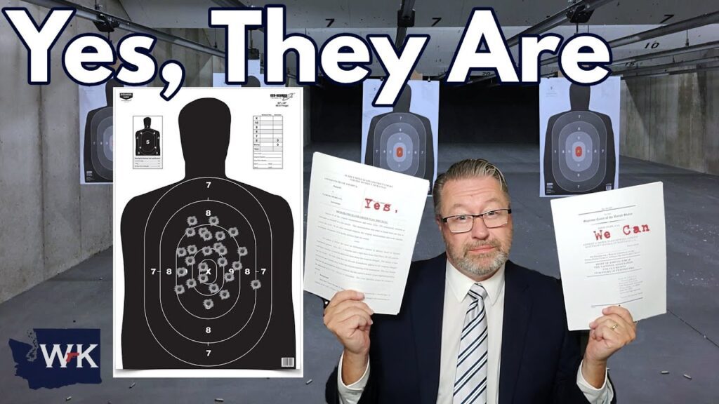 A man in a suit holds two documents with text highlighted in red. Behind him are shooting target papers in a firing range, each marked with clustered bullet holes. Large text above reads, "Yes, They Are.