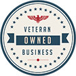 All Listings 6 Circular emblem with an eagle design at the top. Text in the center reads "Veteran Owned Business" in blue and red. The border features blue stars.