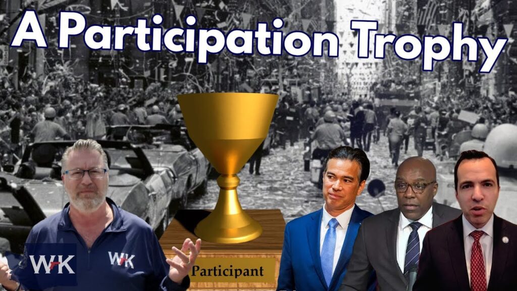 A large golden trophy labeled "Participant" is in the center, with confetti and a cheering crowd in the background. Four men in suits and another man in casual clothes stand in front, under the text "A Participation Trophy.