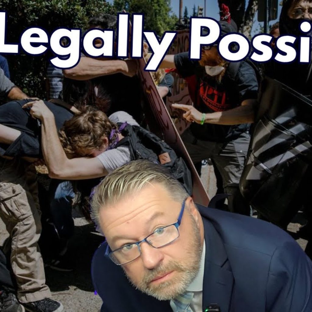 A man in a suit and glasses looks at the camera in the foreground, while a chaotic protest with people clashing and shields in use occurs behind him. Large text at the top reads "Is It Legally Possible?.